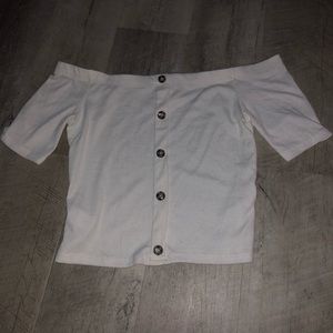 White off the shoulder too with brown buttons